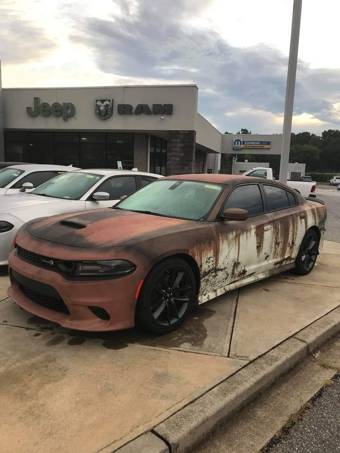 We analyze hundreds of thousands of used cars daily. This Brand New Dodger Charger With A Rustic Wrap At A Car Dealership Car Dealership Weird Cars Car